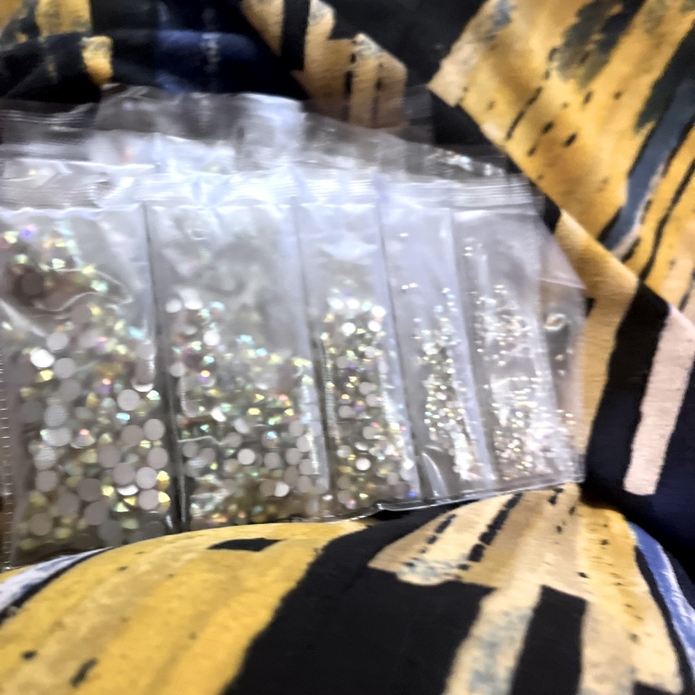 This is a re post stones and glitter for sale individually